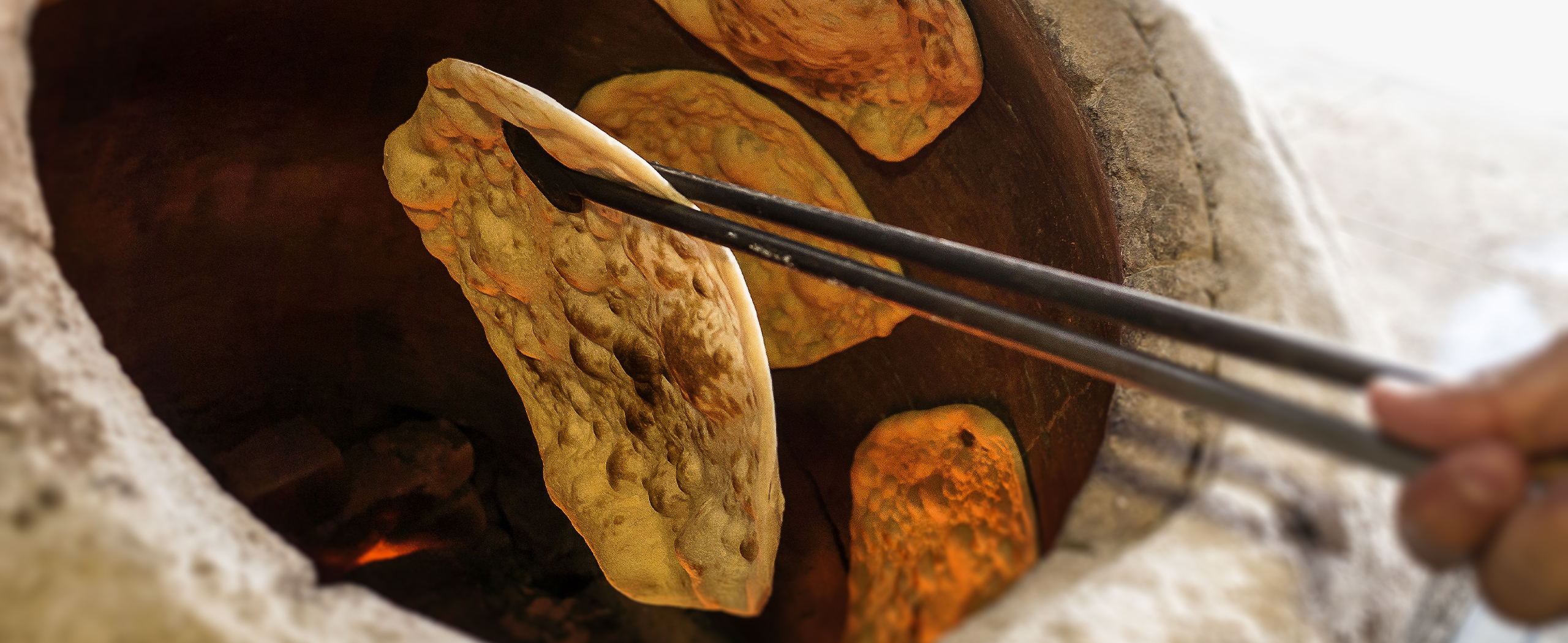 tandoor oven. tandoori cuisine. tandoori food. how a tandoor oven works. the origin of tandoor oven. how to use a tandoor oven. marinades and spices for tandoori cooking.